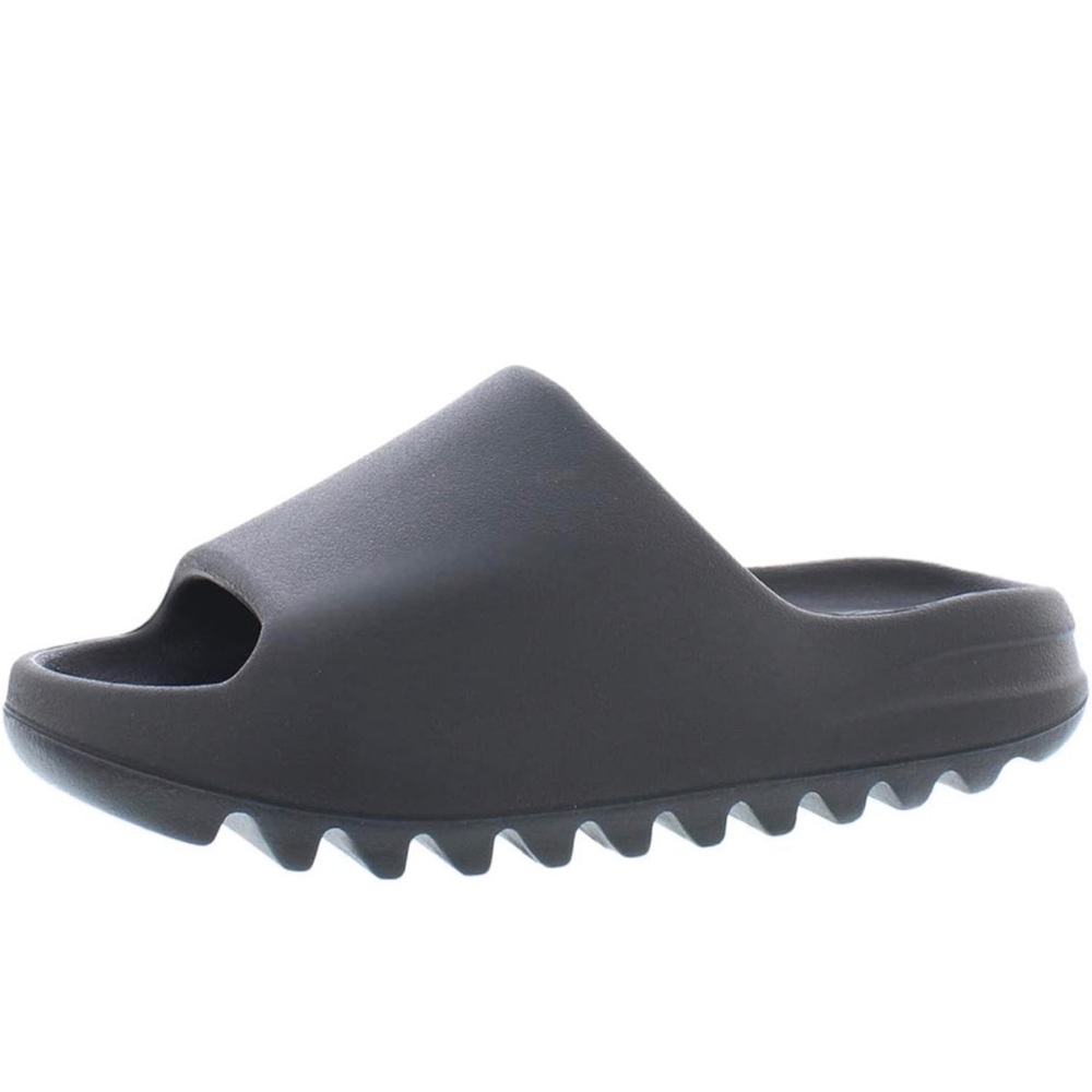 Yeezy slides. Onyx. Size 8. Brand new in box. Never worn.
